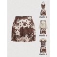 thumbnail image 1 of Multicolor Cow Print Suede A-Line Mini Skirt With Fringe And Studs, 1 of 7