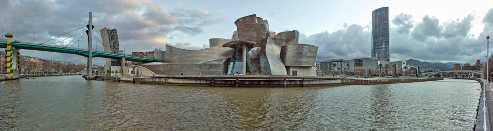 Museum at the waterfront Nervion River Guggenheim Museum Bilbao Abando Bilbao Spain Canvas Art - Panoramic Images (6 x 21)