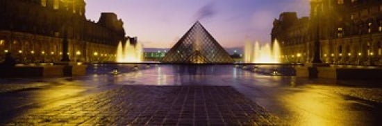 Museum lit up at night with ghosted image of three men Louvre Museum Paris France Canvas Art - Panoramic Images (36 x 12)