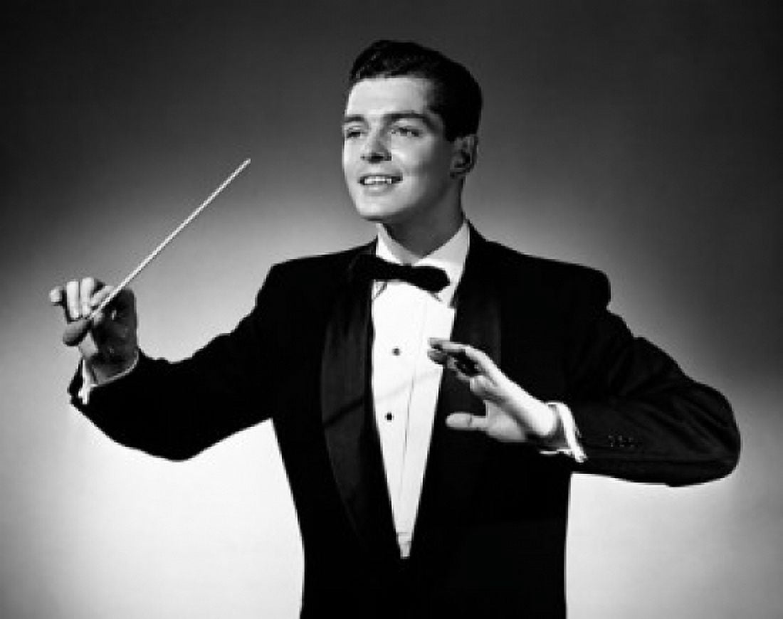 Music conductor holding a baton and smiling Canvas Art - (18 x 24)