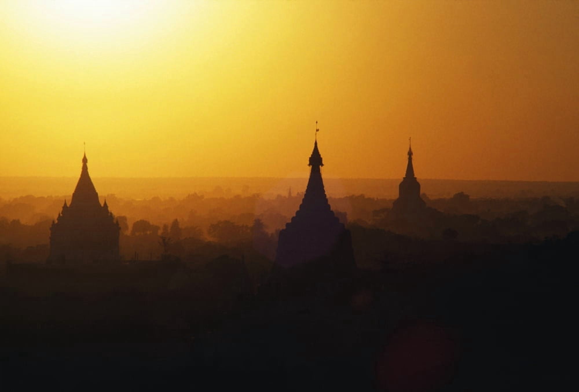 Myanmar (Burma) Mandalay Sagaing Hills Pagodas Silhouetted At Sunrise Canvas Art - Robert Sablan Design Pics (19 x 12)