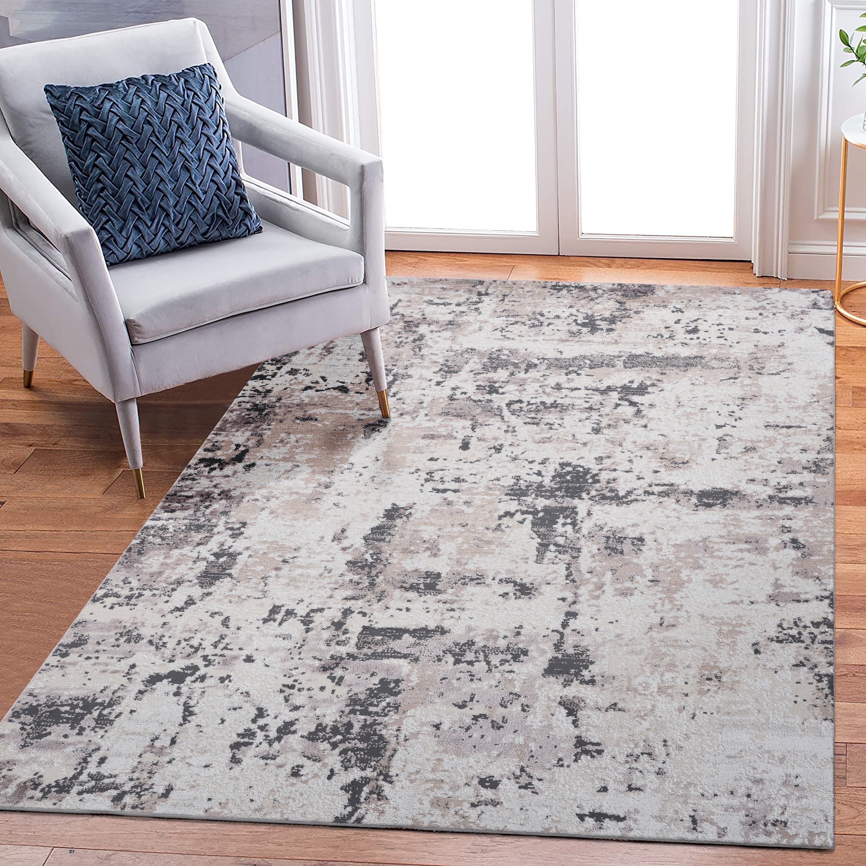 Cream and Brown Abstract Synthetic 5' x 7' Area Rug