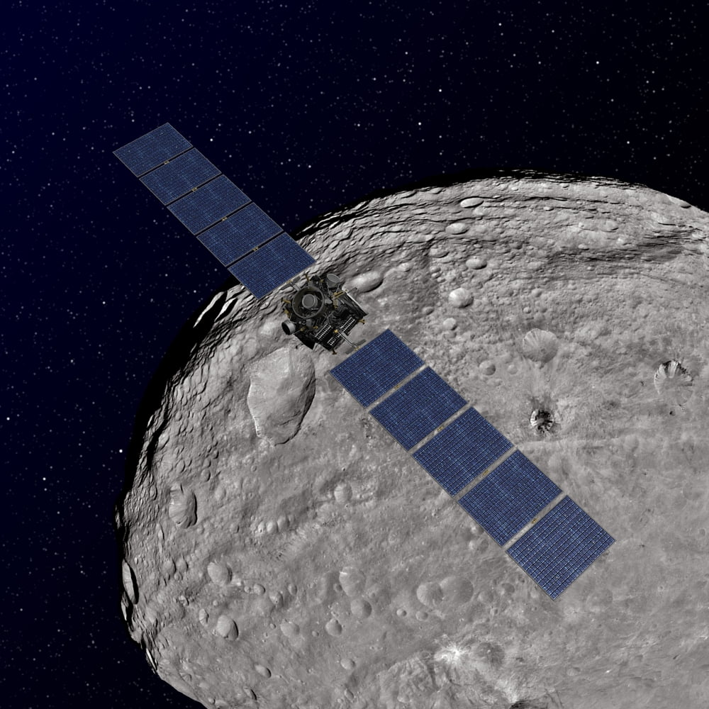 NASAs Dawn spacecraft orbiting the giant asteroid Vesta Canvas Art - Stocktrek Images (28 x 28)