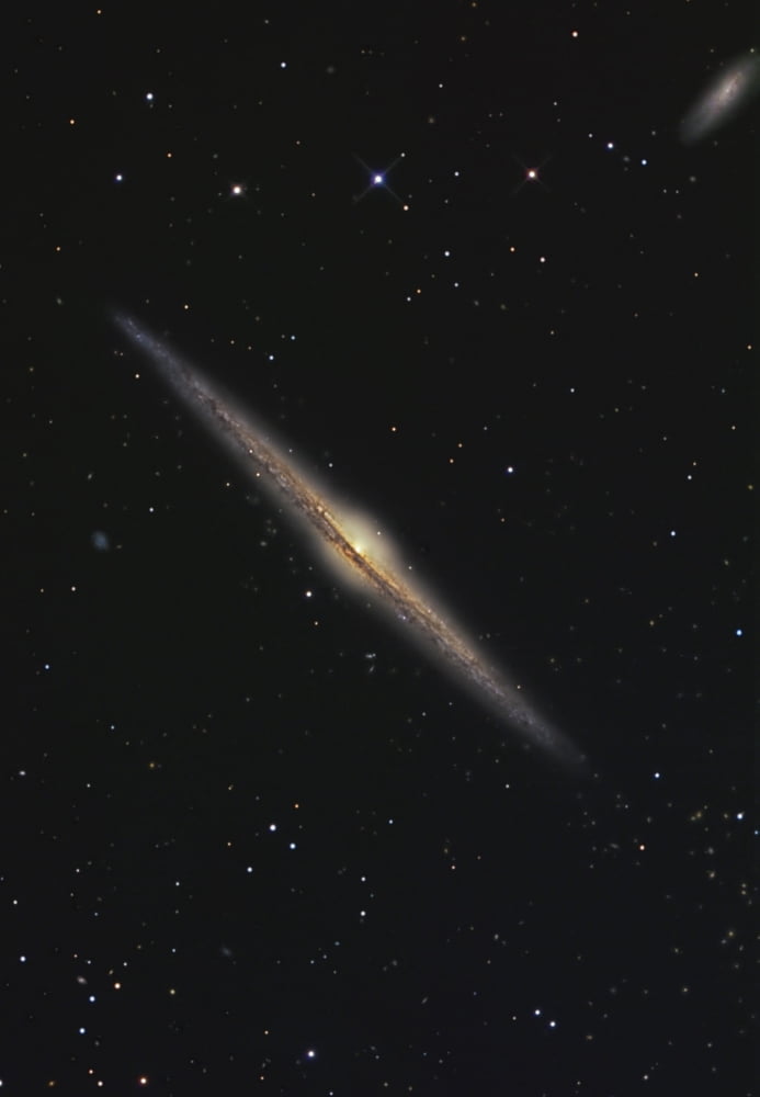 NGC 4565 is an edge-on barred spiral galaxy in the constellation Coma Berenices Canvas Art - R Jay GaBanyStocktrek Images (12 x 17)
