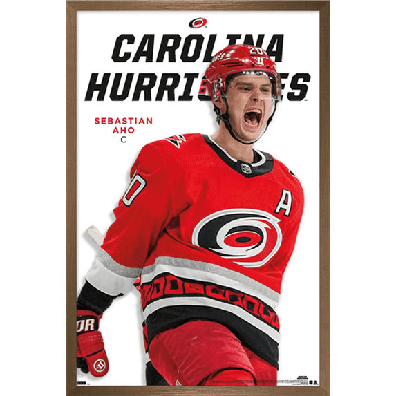 NHL Carolina Hurricanes - Sebastian Aho Feature Series 23 Wall Poster, 22.375" x 34" Framed
