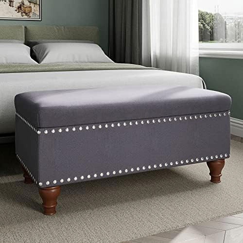 Quincy Grey Tufted Storage Ottoman with Bun Legs and Nailhead Trim