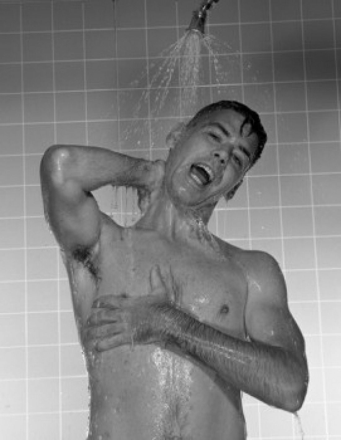 Naked man taking shower Canvas Art - (18 x 24)
