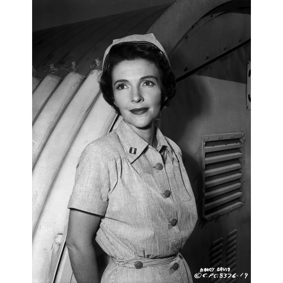 Nancy Davis posed in Nurse Outfit in Black and White Photo Print (8 x 10)