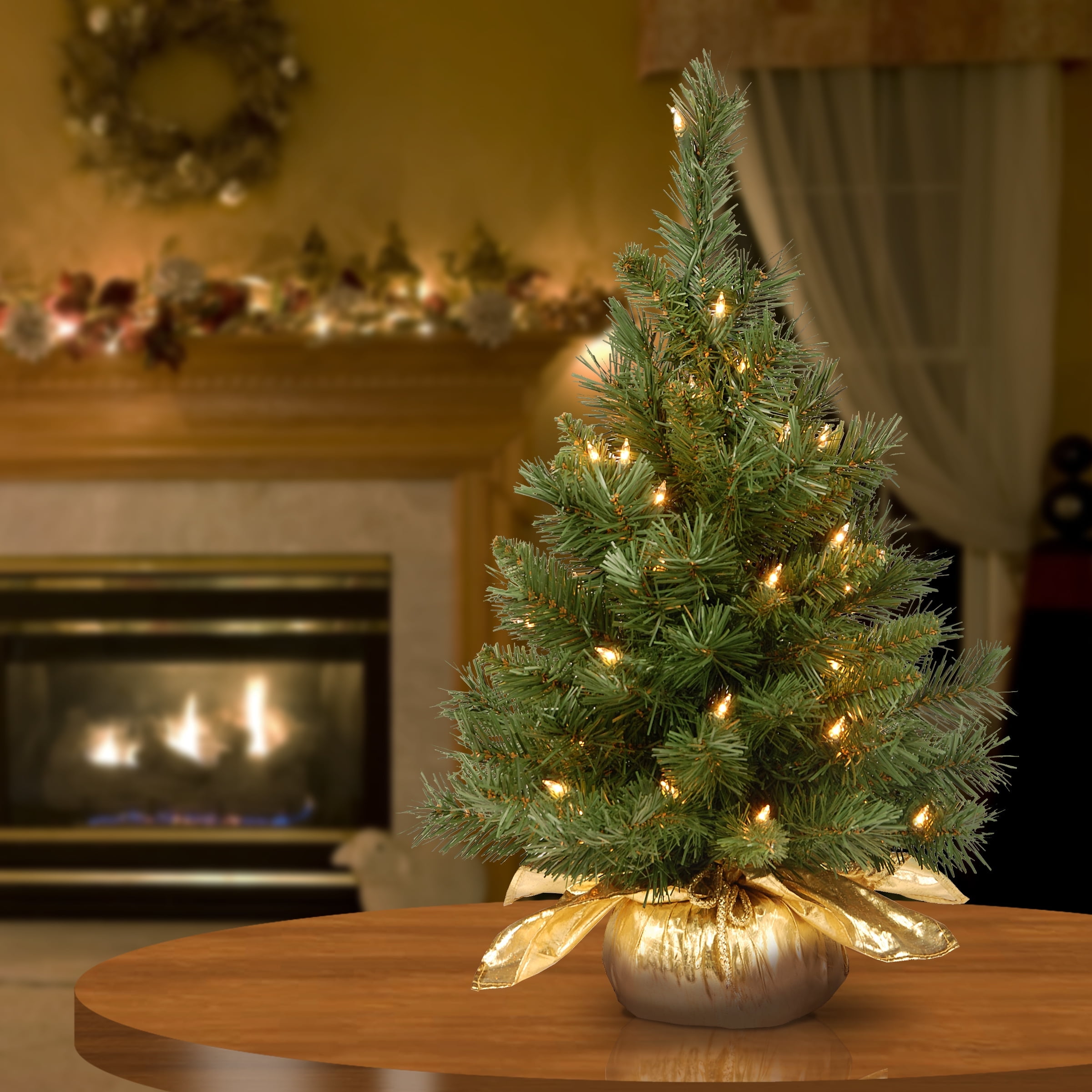 National Tree Company 2 ft. Pre-Lit Artificial Majestic Fir Christmas Tree, Green, Clear Lights, Includes Gold Cloth Base