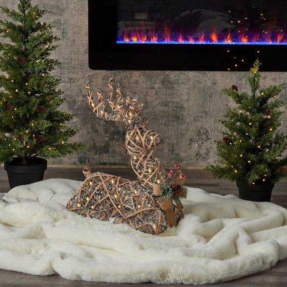 Natural 21" Rattan Sitting Reindeer, Pre-Lit with Warm White LED lights, Plug In