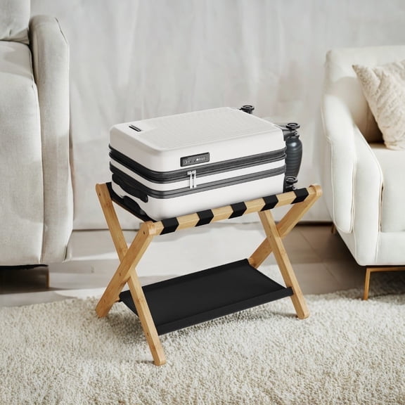 Natural Beige folding luggage rack with a storage shelf. Heavy - duty construction can hold up to 131 lb. Ideal for guest rooms, hotels, and bedrooms