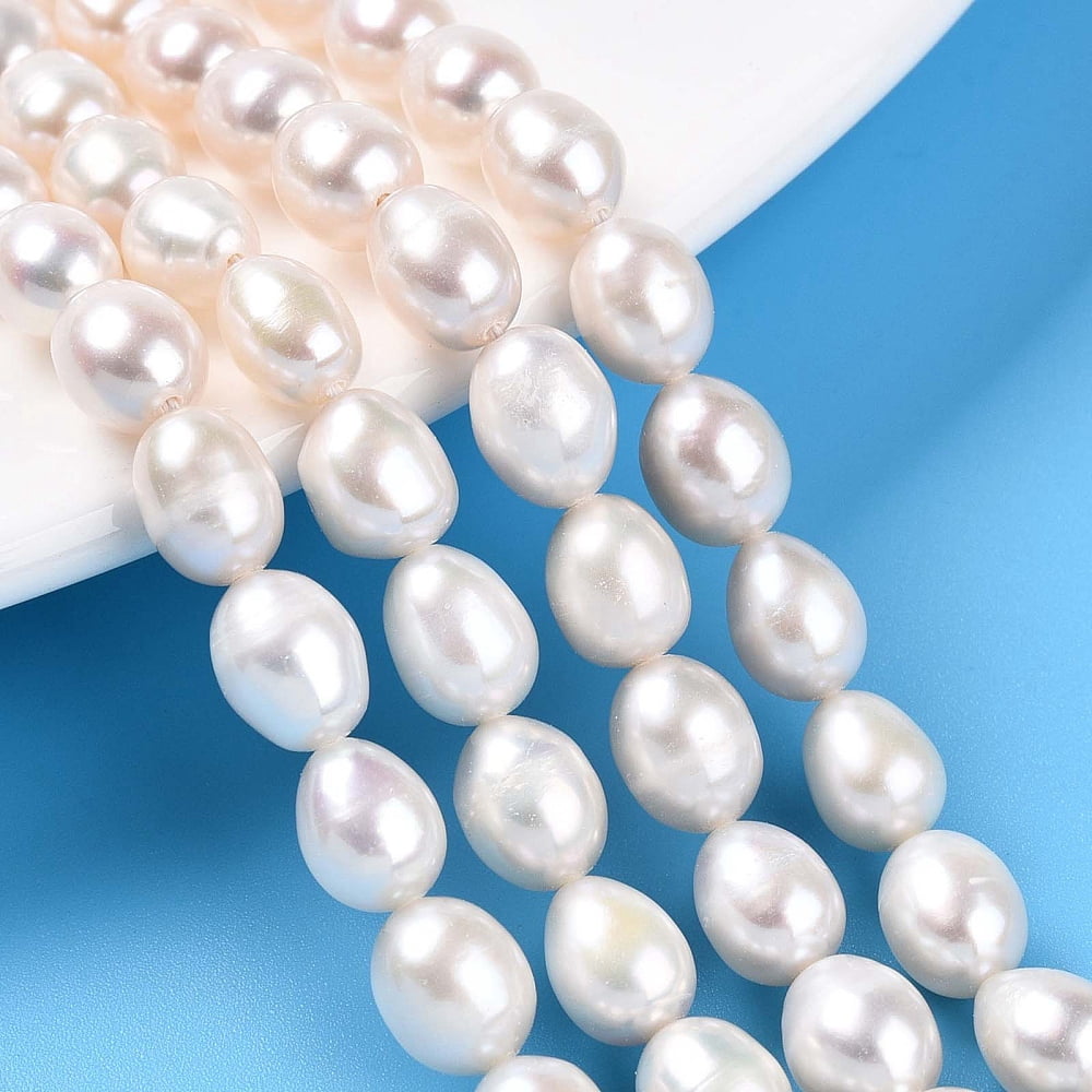 Natural Cultured Freshwater Pearl Beads Strands Rice Creamy White 8~9.5x6~7.5mm Hole: 0.7mm about 41~42pcs/strand 13.98~14.37 inch(35.5~36.5cm)