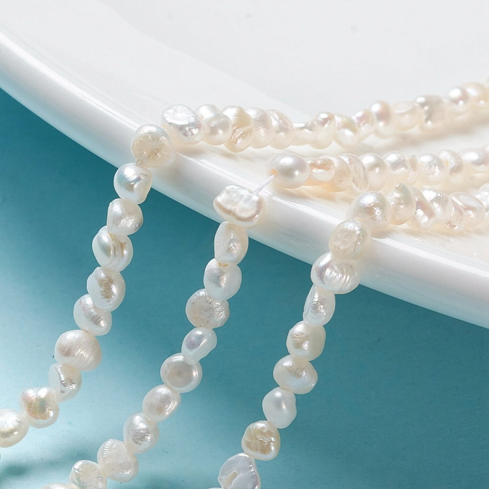 Natural Cultured Freshwater Pearl Beads Strands Two Sides Polished White 3.5~4.5x2.5~3x3~3.5mm Hole: 0.5mm 48pcs/strand 6.61 inch(16.8cm)