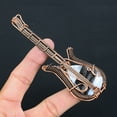 thumbnail image 1 of Natural Owhyee Blue Opal Handmade Copper Wire Wrap Guitar Pendant 4.53, 1 of 4