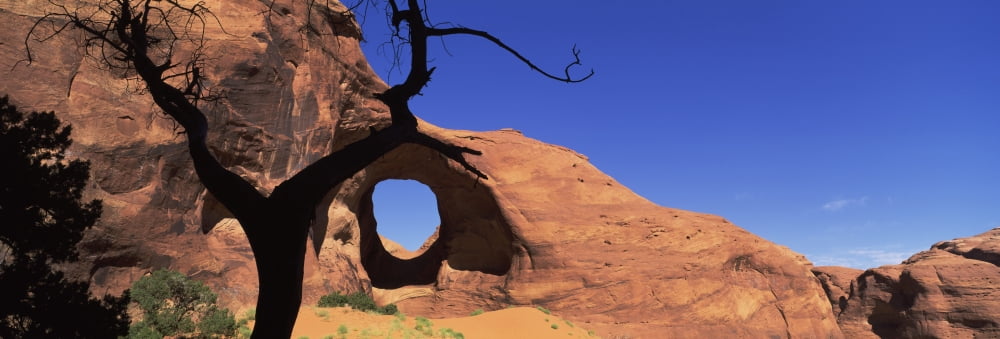 Natural arch in a desert Monument Valley Arizona USA Canvas Art - Panoramic Images (6 x 18)