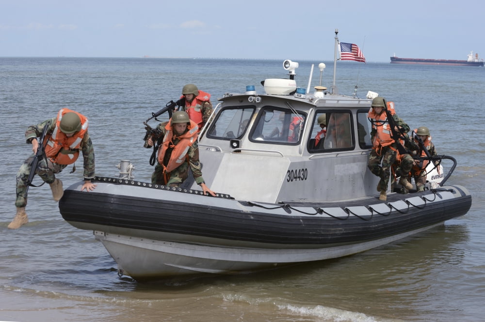 Naval Sea Cadets arrive on the beach during an amphibious-landing Canvas Art - Stocktrek Images (35 x 23)