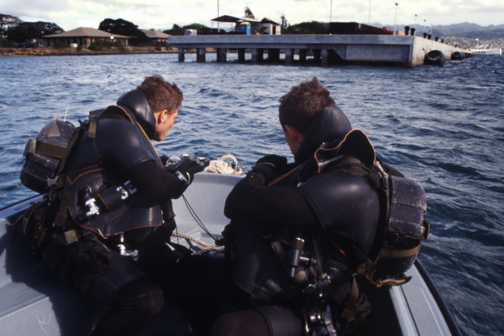 Navy SEAL combat swimmers take compass bearings before entering the water Canvas Art - Michael WoodStocktrek Images (17 x 12)