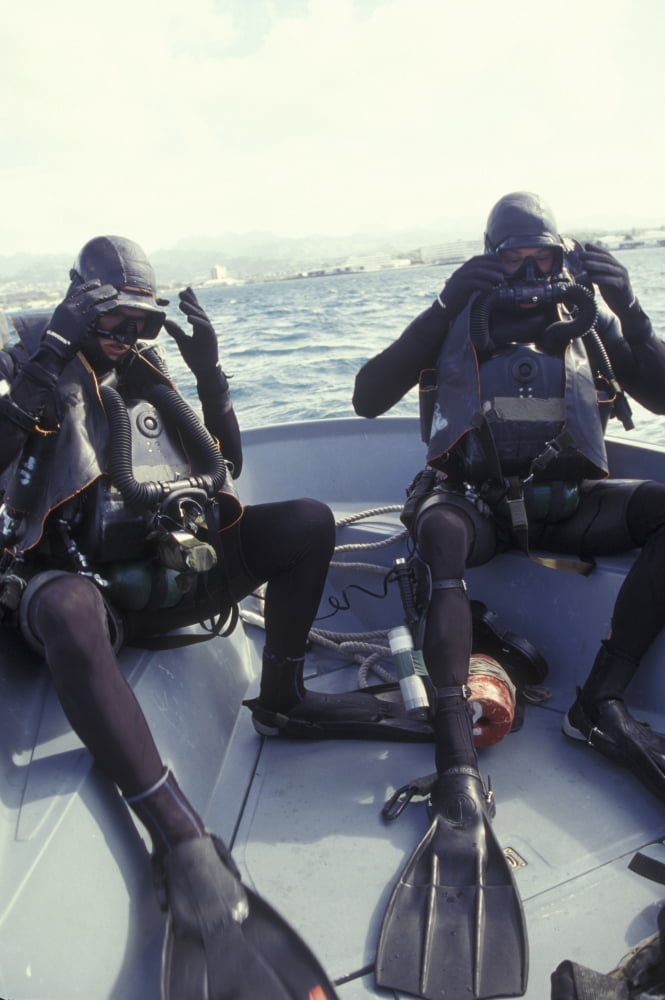 Navy SEALs combat swimmers donn their equipment in a utility boat Canvas Art - Michael WoodStocktrek Images (12 x 17)