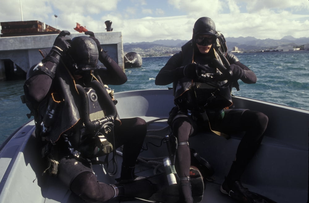 Navy SEALs combat swimmers donn their equipment in a utility boat Canvas Art - Michael WoodStocktrek Images (34 x 23)
