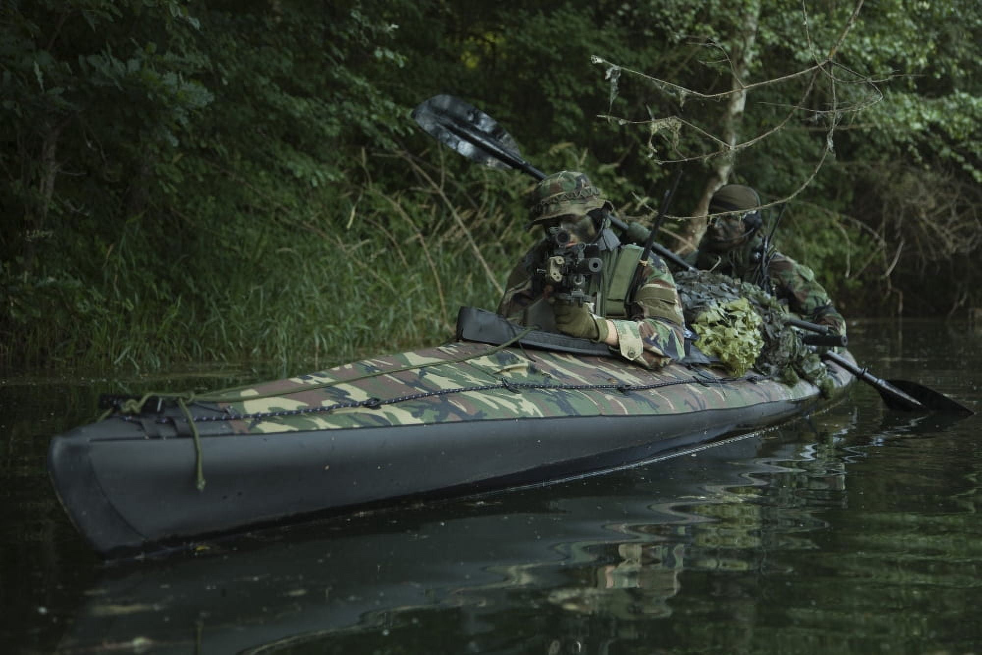 Navy SEALs navigate the waters in a folding kayak during jungle warfare operations Canvas Art - Tom WeberStocktrek Images (35 x 24)