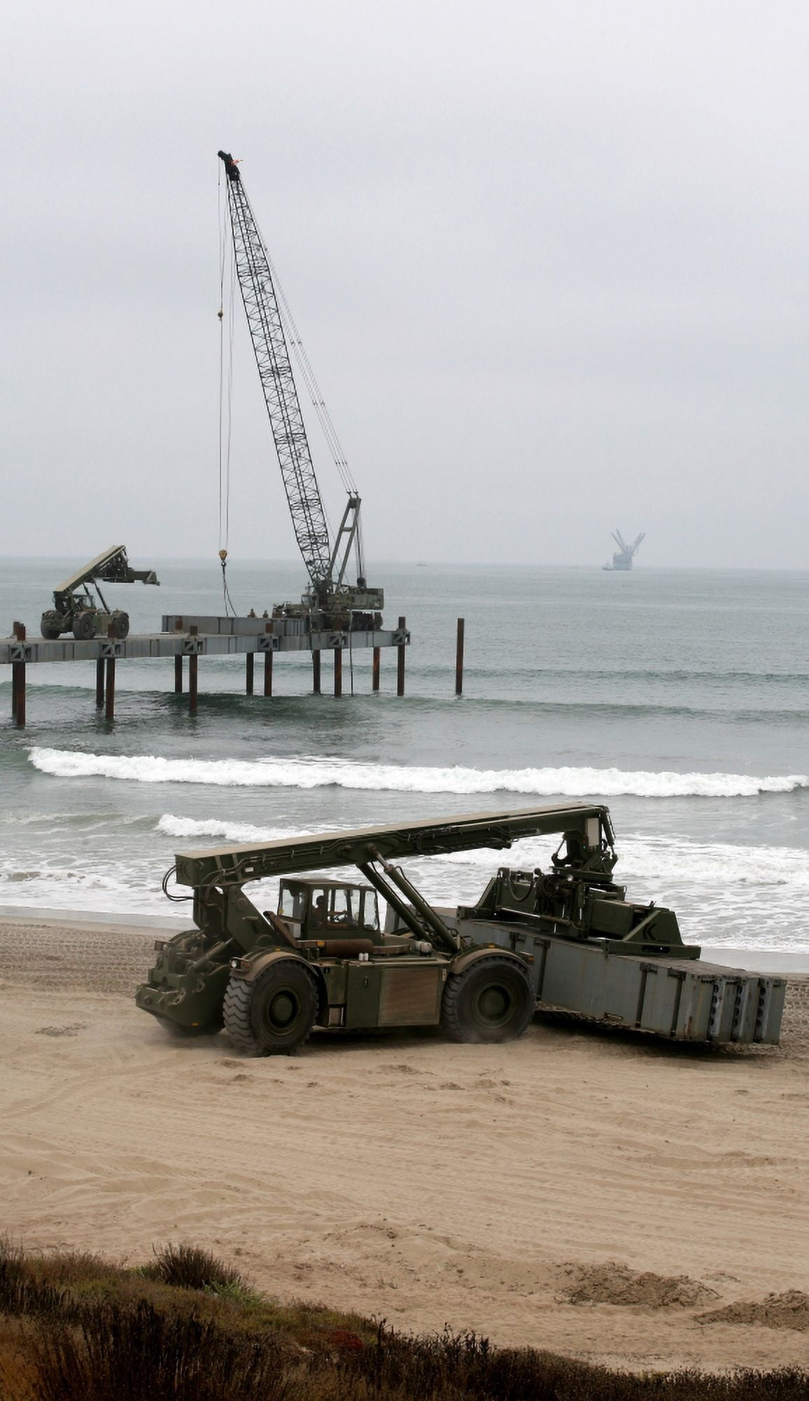Navy Seabees dismantling an Elevated Causeway Modular Canvas Art - Michael WoodStocktrek Images (11 x 18)