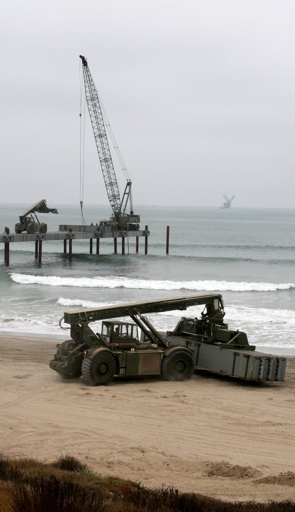 Navy Seabees dismantling an Elevated Causeway Modular Canvas Art - Michael WoodStocktrek Images (21 x 36)