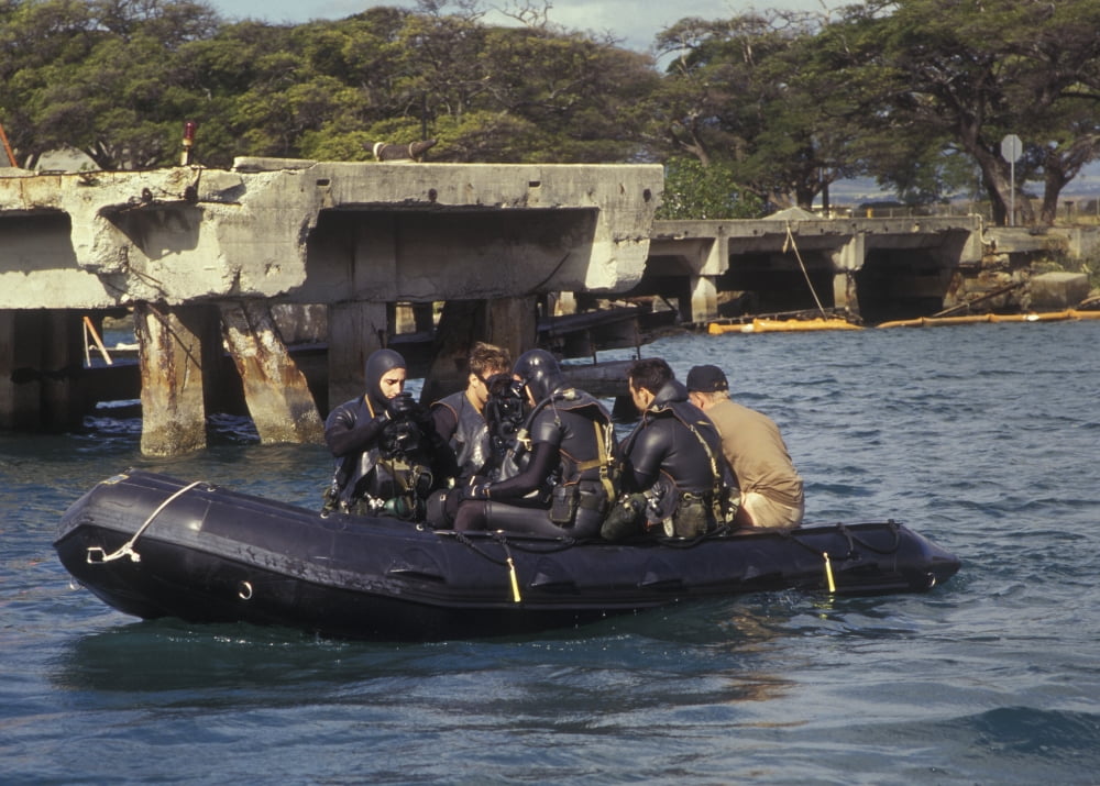 Navy Seals combat swimmers sitting in a combat rubber raiding craft Oahu Hawaii Canvas Art - Michael WoodStocktrek Images (17 x 12)