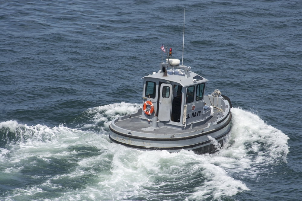 Navy working boat moves back to its mooring Canvas Art - Stocktrek Images (34 x 23)