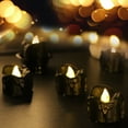 thumbnail image 1 of Neoyler 12 Pack Halloween Decorations Flameless Candles Led for Haunted Parties Spooky Decor Long Lasting Battery Operated Safe Office Use Suit Gift High Safety Simulation Light 1.4in Black, 1 of 6