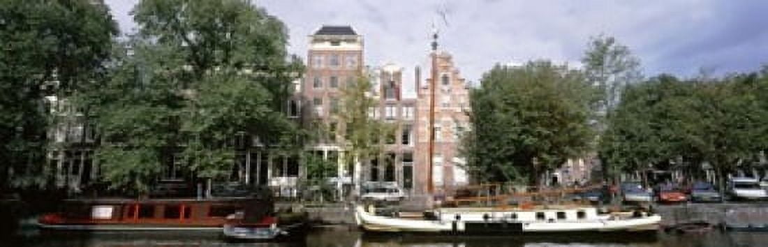 Netherlands Amsterdam Boats in canal Canvas Art - Panoramic Images (18 x 6)