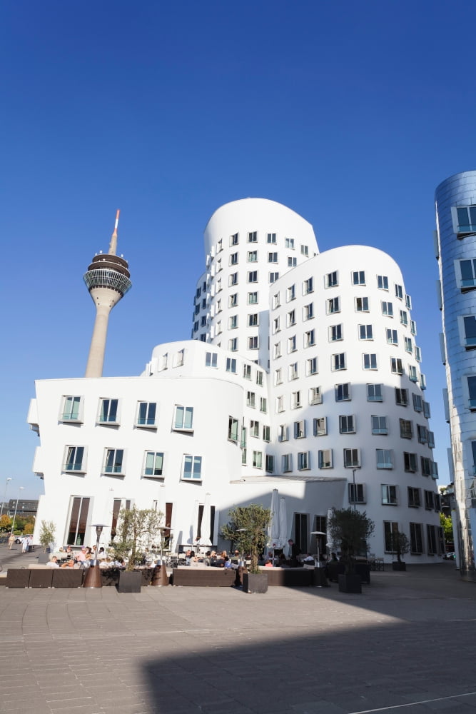 Neuer Zollhof buildings designed by Frank Gehry with Rheinturm Tower Media Harbour Dusseldorf North Rhine Westphalia Germany Canvas Art - Panoramic Images (27 x 9)