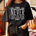 thumbnail image 1 of Never Trust the Living Shirt, Halloween Movie Shirt, Horror Movie Spooky Season Tee, Fall Goth Weirdcore Goblincore Gift, 1 of 3