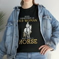 thumbnail image 1 of Never Underestimate An Old Woman Who Rides A Horse Funny Tshirt, 1 of 2