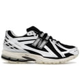 thumbnail image 1 of New Balance Men's 1906R White Black Metallic Running Shoes, from StockX, 1 of 5