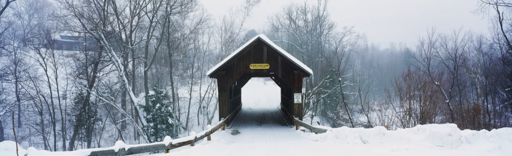 New England covered bridge in winter Canvas Art - Panoramic Images (27 x 9)