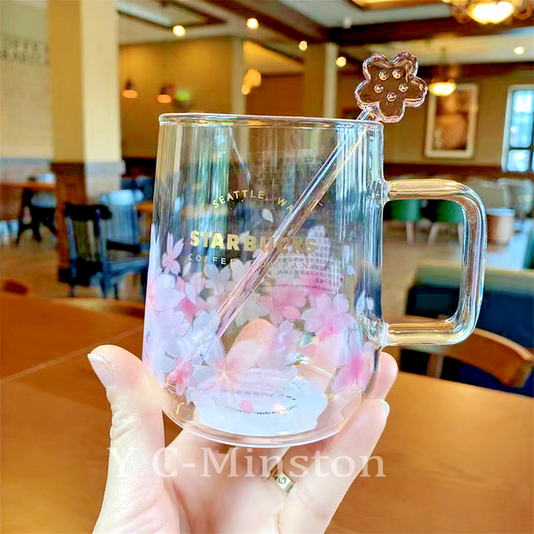 https://i5.walmartimages.com/seo/New-Starbucks-Pink-Sakura-Color-changing-Glass-Coffee-Mug-Cup-with-Flower-Stick_6316393c-a88c-4c48-9acc-d463f4ada5a1.e4349eb8a99413ba08084dde489d5acd.png?odnHeight=768&odnWidth=768&odnBg=FFFFFF