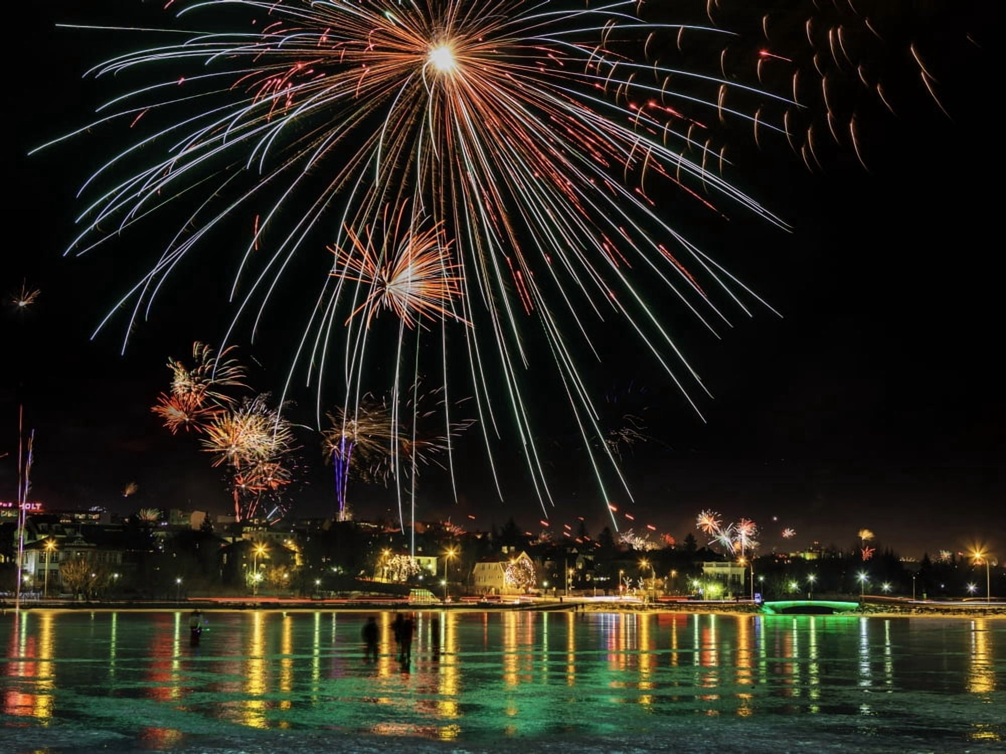 New Year's eve fireworks are legal in Iceland and most people take part in the celebration Canvas Art - Panoramic Images (12 x 16)