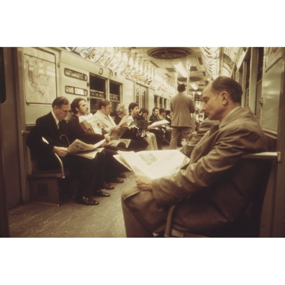 New York City Subway. Passengers With Their Newspapers On The New York City Subway. May 1973. History