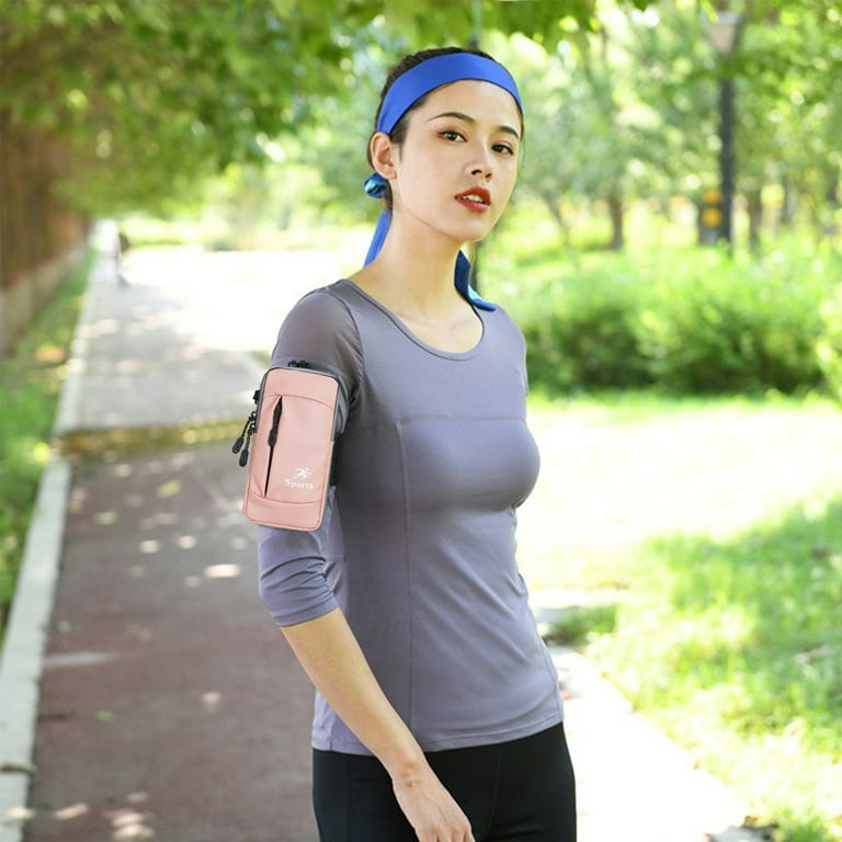 Nhthy Adjustable Sports Arm Band with Detachable Strap for Running Universal Phone Arm Band Crossbody Bag for Men and Women Breathable Oxford Material Cell Phone Arm Carrier for All Activities. Pink