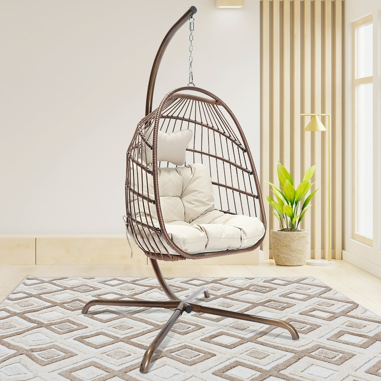 https://i5.walmartimages.com/seo/Nicesoul-Foldable-PE-Wicker-Brown-Hanging-Egg-Chair-With-Stand-Swing-Chair-With-Cushion-and-Pillow-Capacity-350lbs_014a7b83-505a-437e-8e72-079adc9b8bdf.5a91d690e4ad1a89399272281336b51b.jpeg?odnHeight=768&odnWidth=768&odnBg=FFFFFF