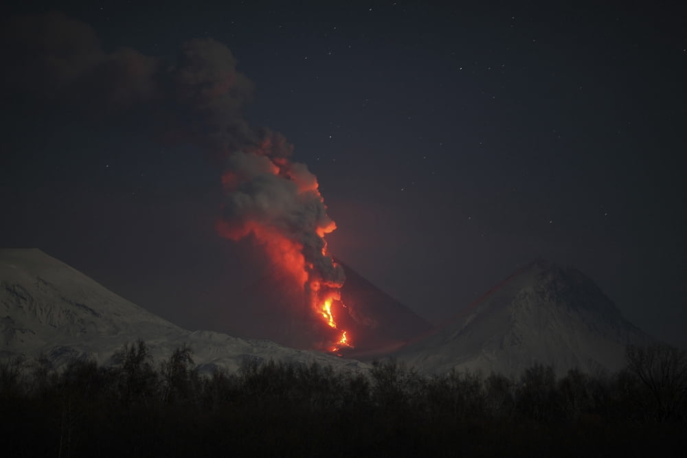 Nighttime eruption of Kliuchevskoi Volcano Russia Canvas Art - Richard RoscoeStocktrek Images (18 x 12)