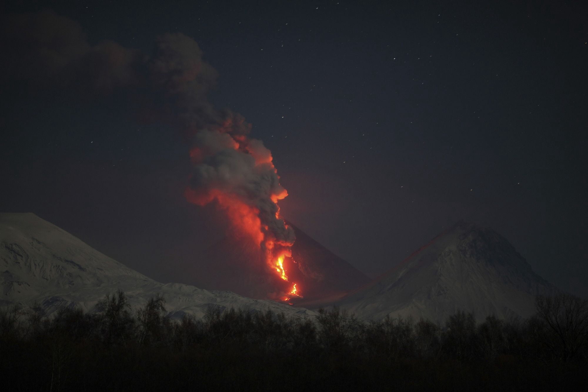 Nighttime eruption of Kliuchevskoi Volcano Russia Canvas Art - Richard RoscoeStocktrek Images (35 x 23)