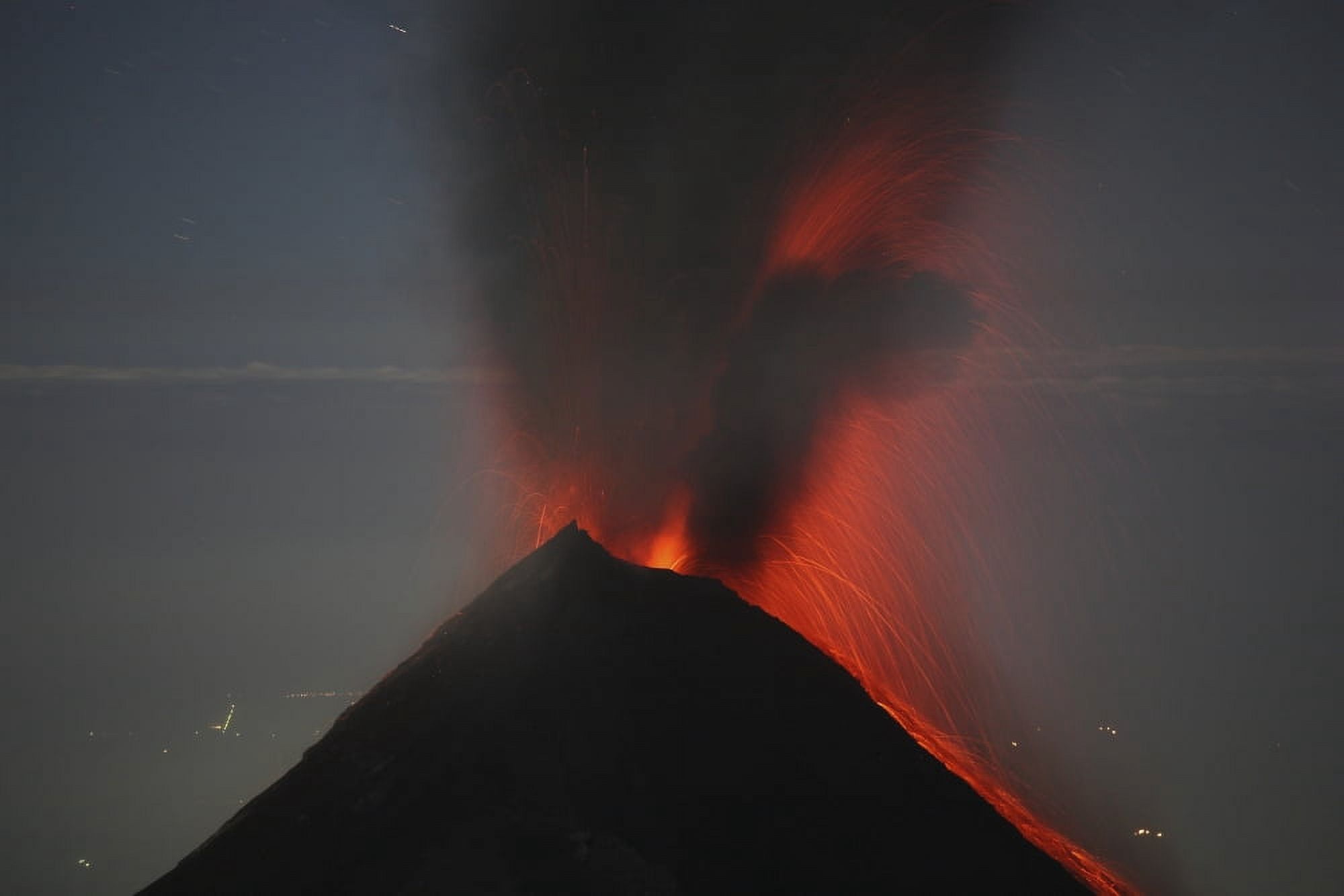 Nighttime lava eruption of Fuego volcano Antigua Guatemala Canvas Art - Richard RoscoeStocktrek Images (35 x 23)