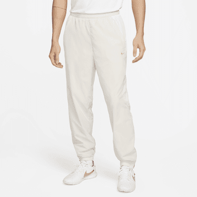 Nike Culture of Football Men's Therma-FIT Repel Soccer Pants Color: Light Orewood Brown/Summit White/Metallic Gold Size: S