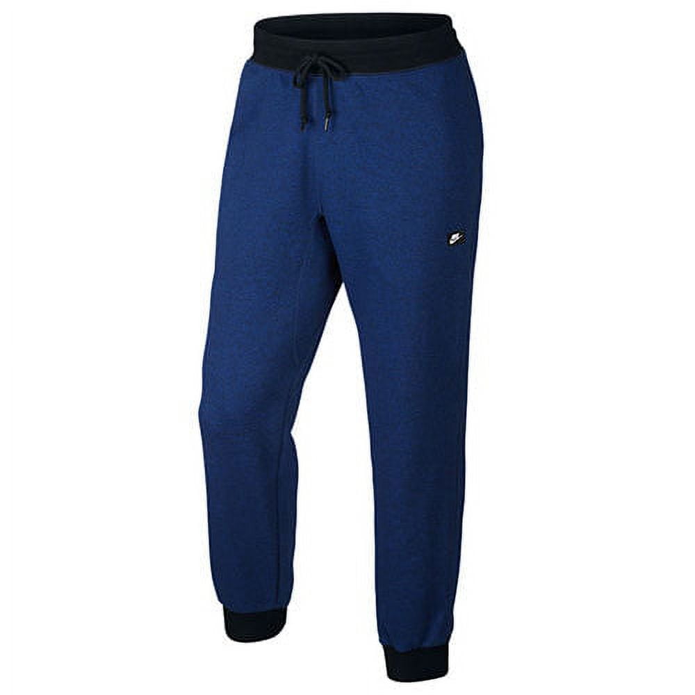 Nike aw77 cuffed sweatpants black hotsell