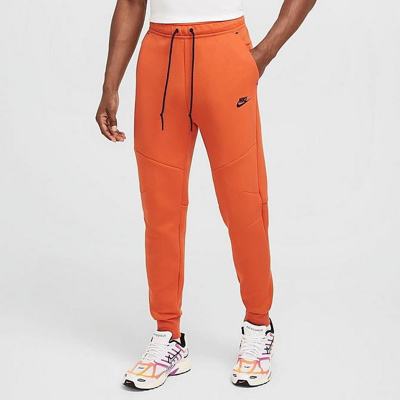 orange nike sweatpants mens