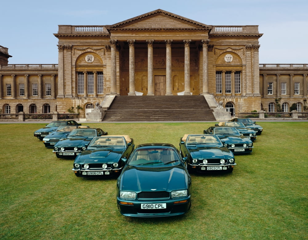 Nine 1990 Aston Martins in V-formation on the lawns of Stowe public school Country of origin United Kingdom Canvas Art - Panoramic Images (22 x 28)