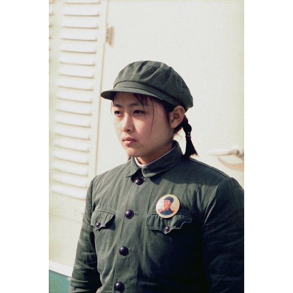 Nixon In China. Young Chinese Girl Dressed In Soldier Attire And A Portrait Pin Of Mao At The Arrival Ceremonies At Beijing For The Press Plane During Nixon'S Trip To China. Feb. 21 1972. History (18