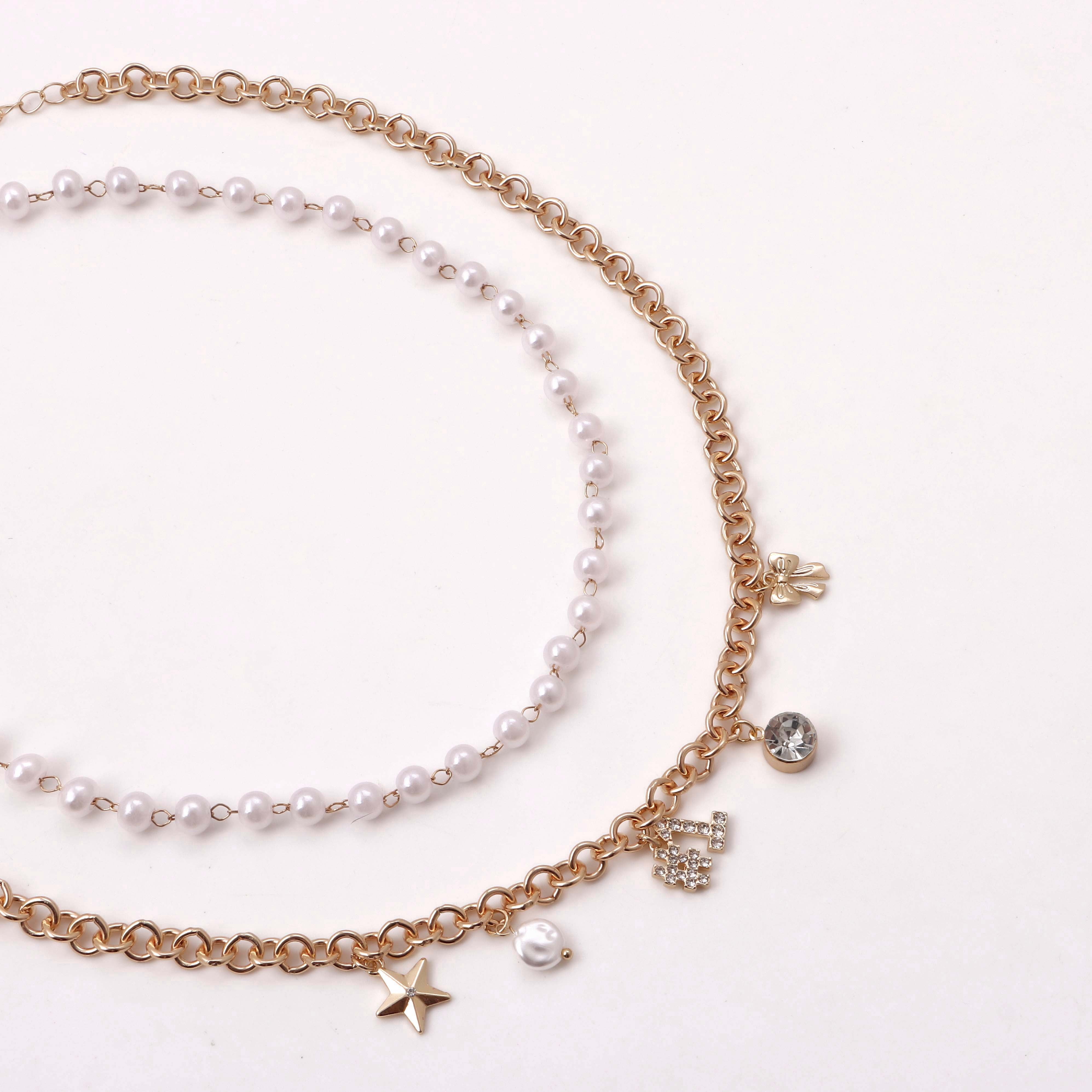 No Boundaries Women's 2 pc Game Day White Beads and Gold Tone Charm Necklace Set With #1, Bow & Star