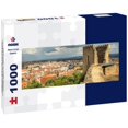 thumbnail image 1 of Noah Jigsaw Puzzle Castle tower of Castelo Branco, Portugal, with the city in the background and a sky with big clouds, panorama Panorama 1000 Pieces, 1 of 2
